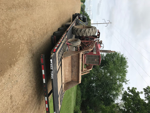 Transporting a Tractor on a Flatbed Truck