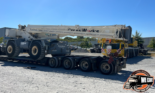 Rough terrain crane loaded and prepared for shipping