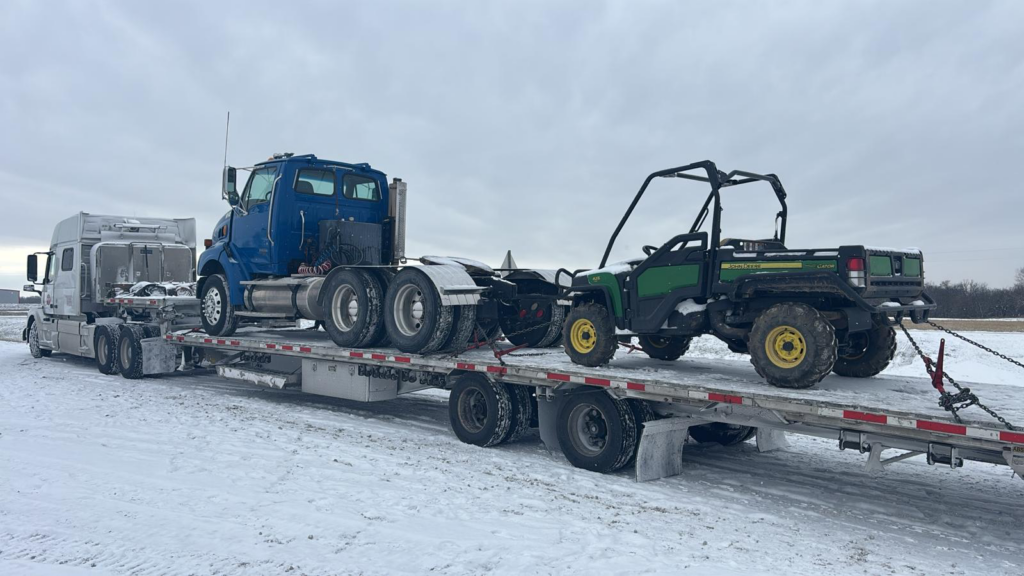 Sterling A9500 Day Cab and 2015 John Deere 825I Gator XUV