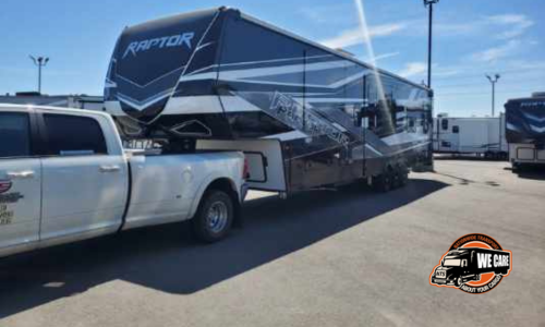 rv being towed by a pickup truck