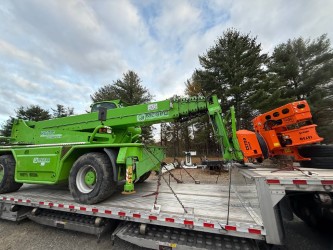 Merlot ROTO 4030 telehandler with wood cracker attachment