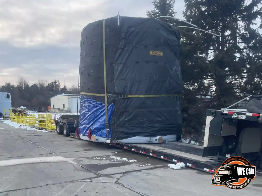 Transporting a wrapped cylinder.